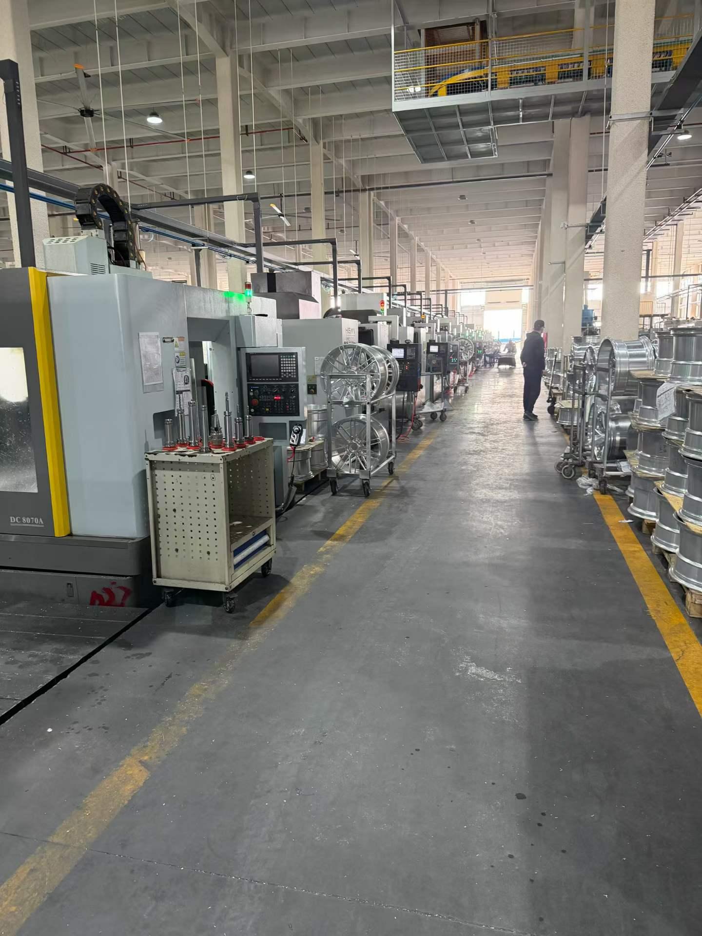 Walking the aisle past the production machines